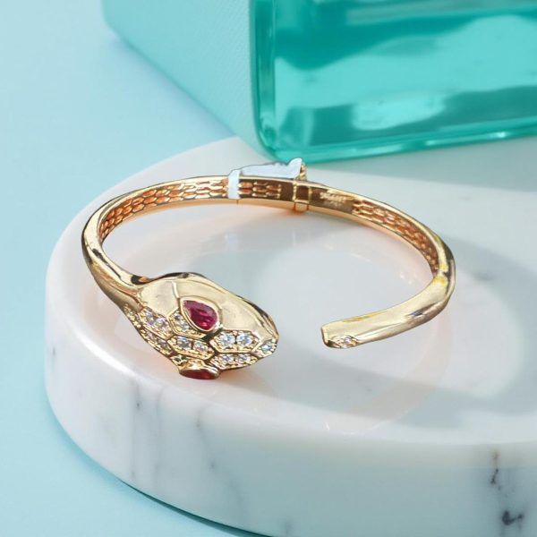 Pulsera dorado con rojo - Imagen 2